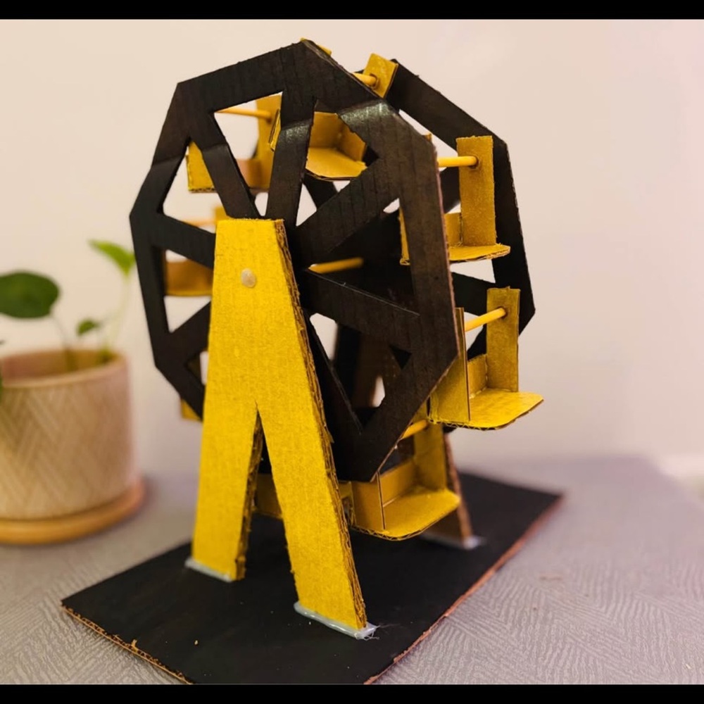 Black and Yellow Ferris Wheel Art Piece